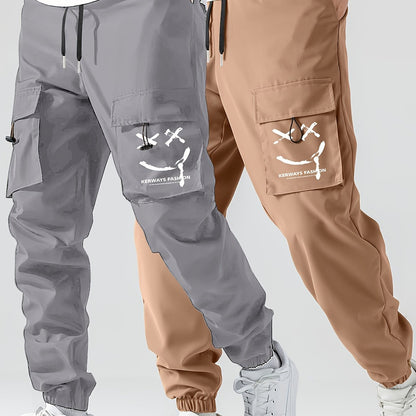 2 Pcs Men's Stylish Smiling Face Pattern Cargo Jogger With Pockets, Causal Breathable Drawstring Men's Bottom Clothing For City Walk Street Hanging Outdoor Activities